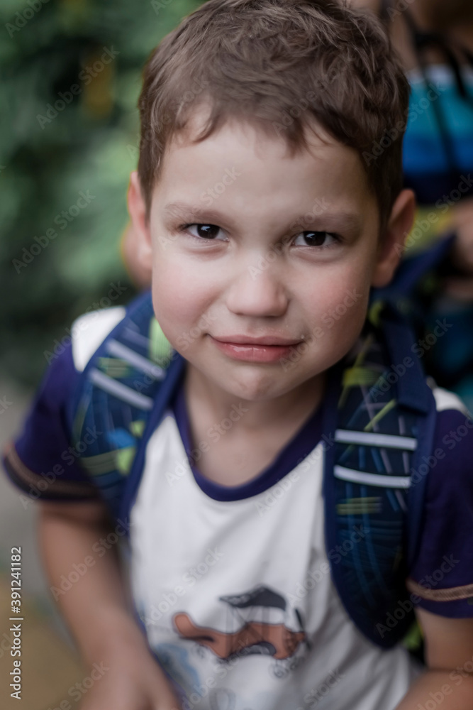 Portrait of a caucasian boy crying through laughter. А tear behind the smile. Portrait of a caucasian boy crying through laughter. А tear behind the smile.