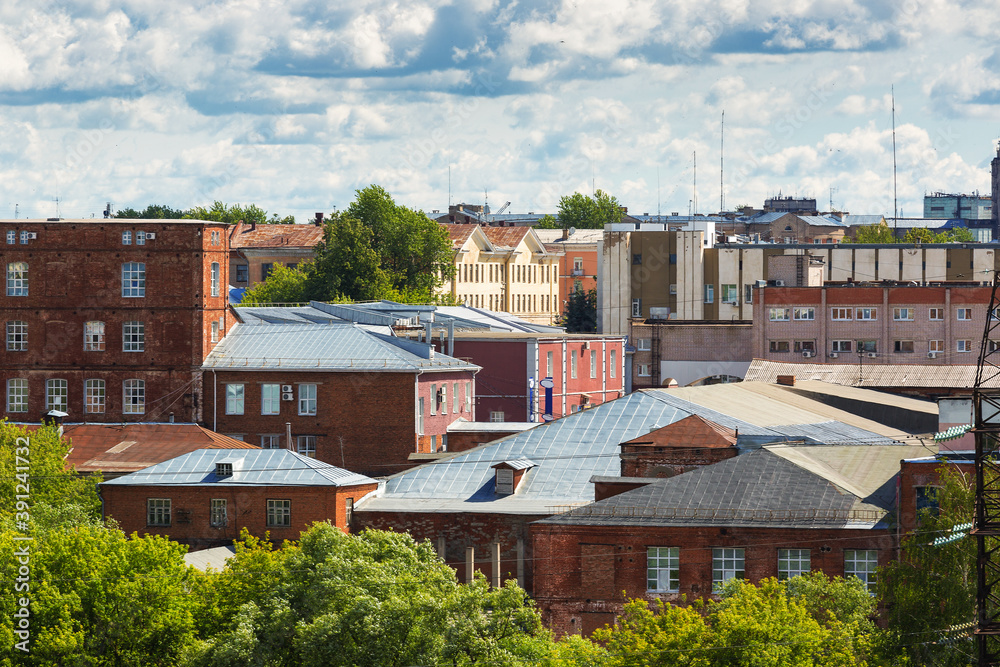 view from the window on the old industrial factory zone of the city of Ivanovo in the summer