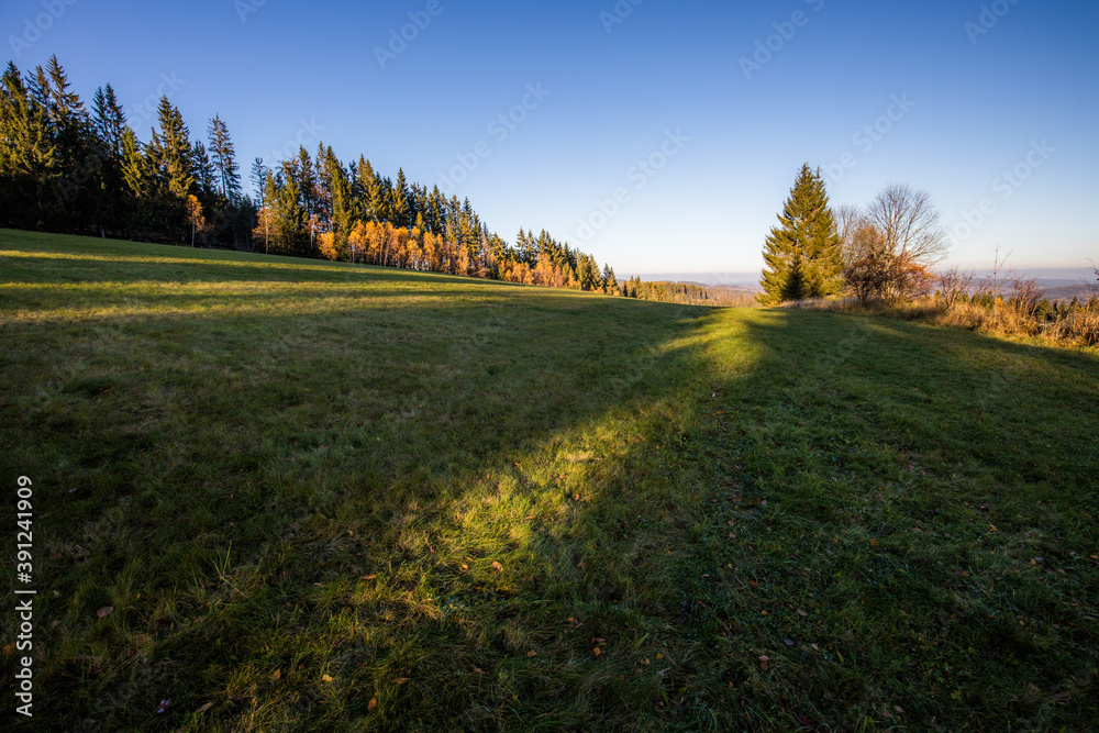 Autumn in the mountains - meadows and forests in colorful colors