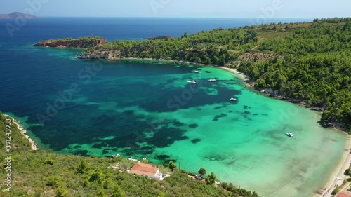 Aerial drone video of paradise beach of Tzortzi gialos with crystal clear turquoise sea, Alonissos island, Sporades, Greece  photo