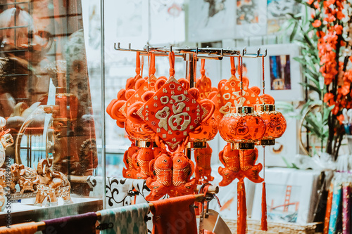 Photography Street shop of hanging red lanterns, fishes of luck, traditional Asian souvenirs