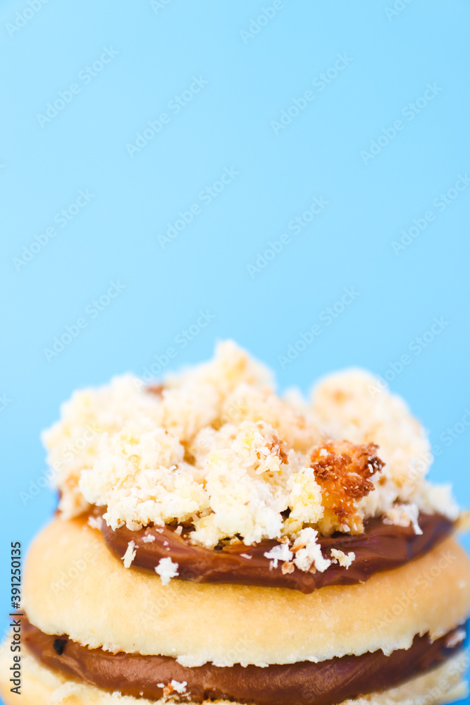 coconut donut with lightblue background coconut donut with lightblue background