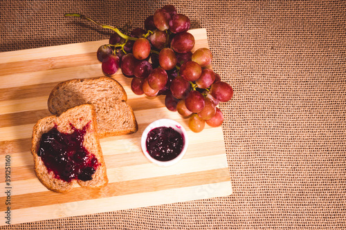 a slice of bread with jelly of grape. also called ''chimia' at Porto Alegre city. rio grande do sul photo