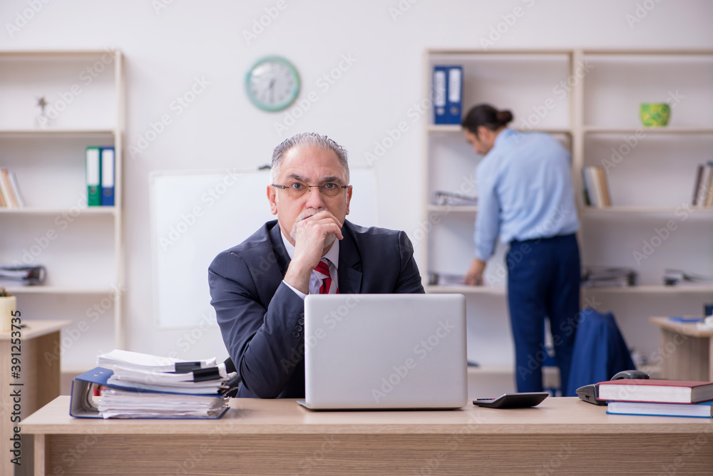 Two employees in the office