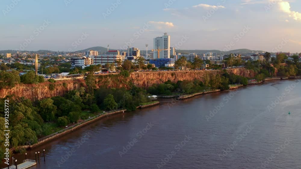 Drone Flying Towards The Cliffs Boardwalk Between Cliff Face And Brisbane River In Brisbane, Australia - aerial Drone Flying Towards The Cliffs Boardwalk Between Cliff Face And Brisbane River In Brisbane, Australia - aerial