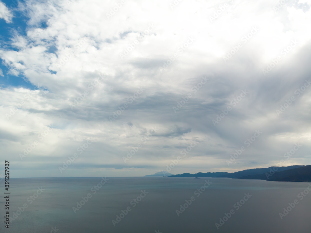 Blue and white sky and sea after storm