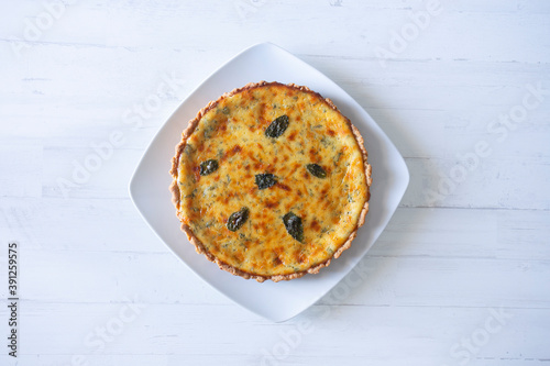 Flaó traditional dessert from Ibiza. The cheesecake is a unique combination of flavors — anise and mint. The filling is made from fresh cheese (or ricotta and mascarpone), eggs and chopped mint.