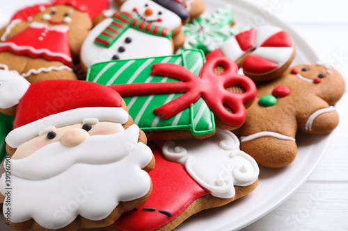 Delicious Christmas cookies on plate, closeup view