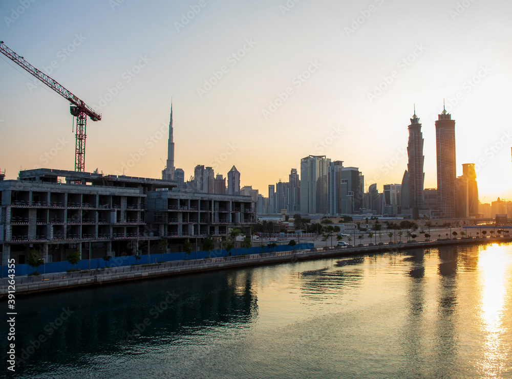 Partial view of Dubai city landscape from the bridge known as a tolerance bridge. Early morning.