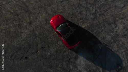 Done shot of muscle and sports cars doing doughnuts and burnouts with a car club in the Angeles National Forest in Southern California