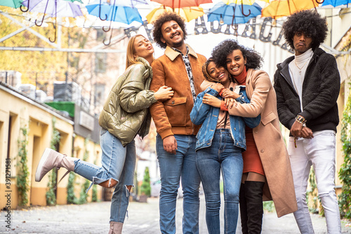 Group of multiracial friends having fun together outdoor