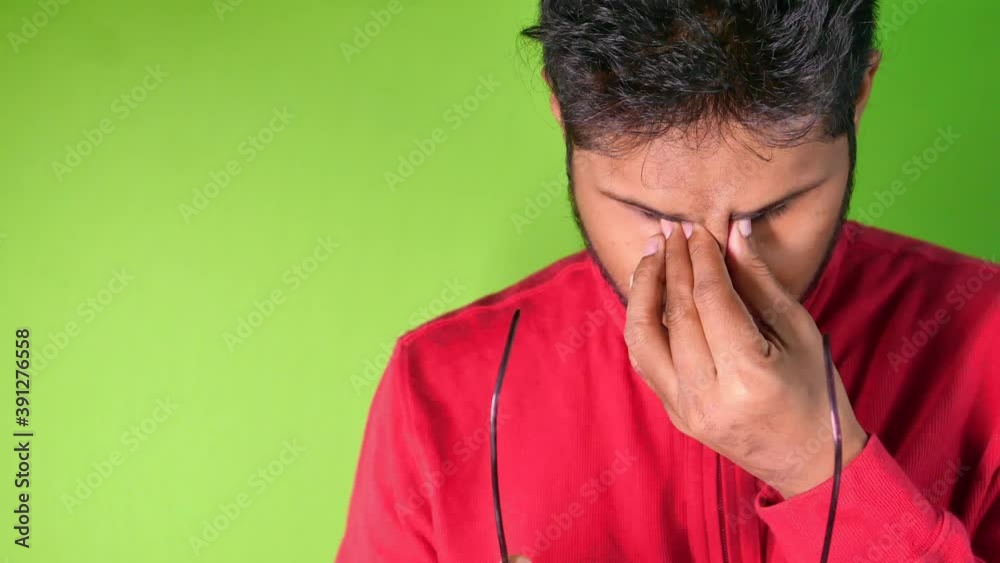 Close up of upset man suffering from strong eye pain Close up of upset man suffering from strong eye pain