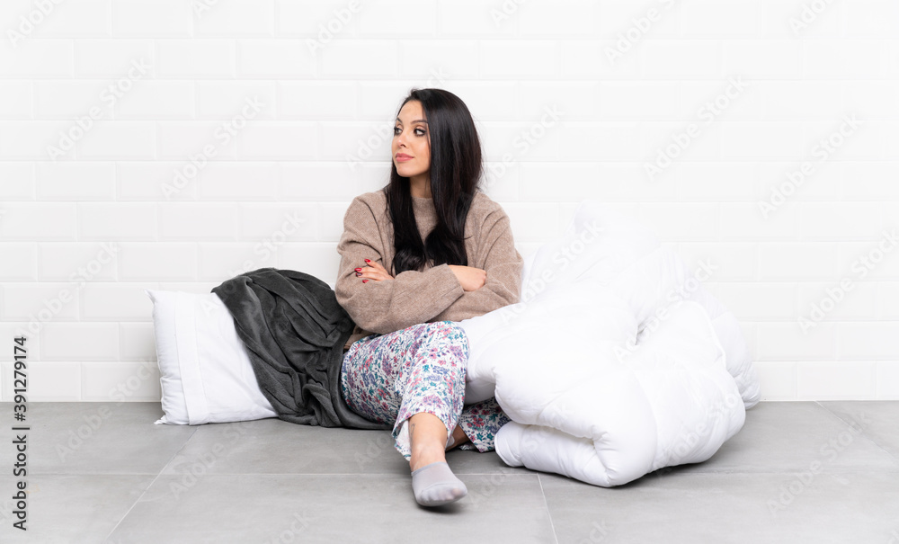 Young Colombian girl in pajamas at indoors portrait Young Colombian girl in pajamas at indoors portrait