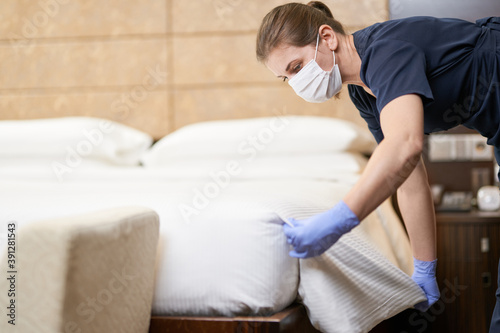 Housekeeping staff cleaning room before customers arrival