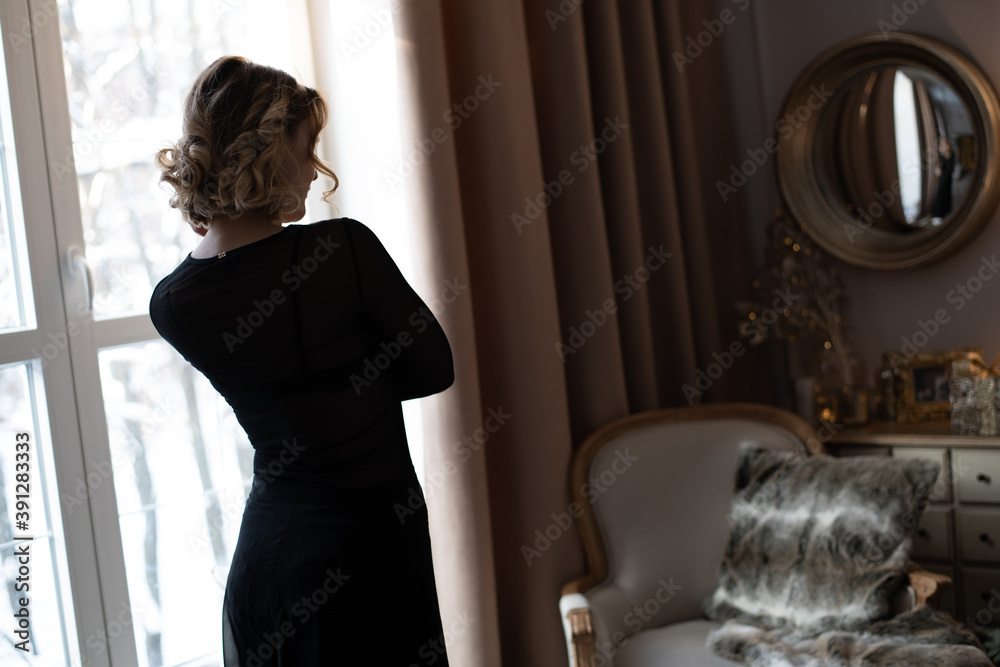 woman looking out window woman looking out window