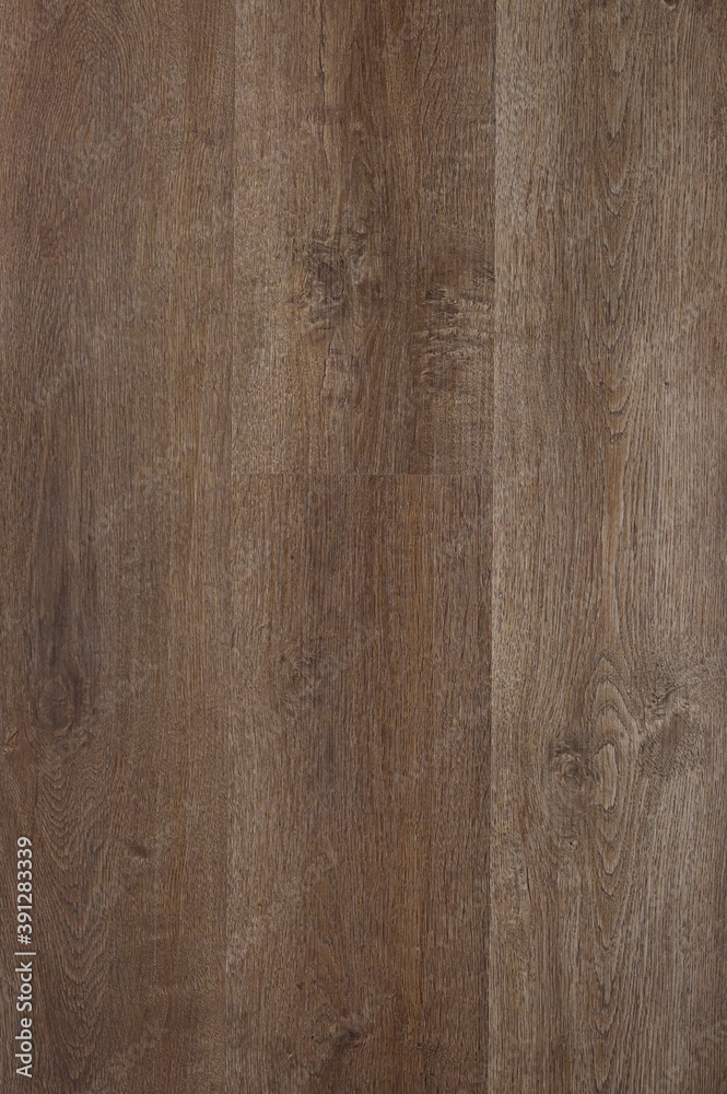 Hardwood laminate floor viewed from above for natural texture and background. Hardwood laminate floor viewed from above for natural texture and background.