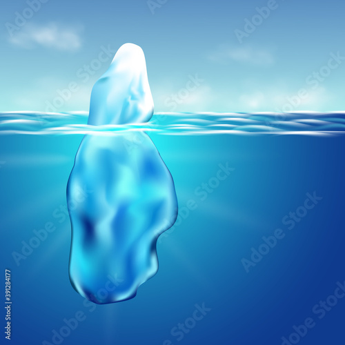 Iceberg floating among ice floes in the blue Antarctic sea.WInter arctic landscape with blue pure water and snow hills.
