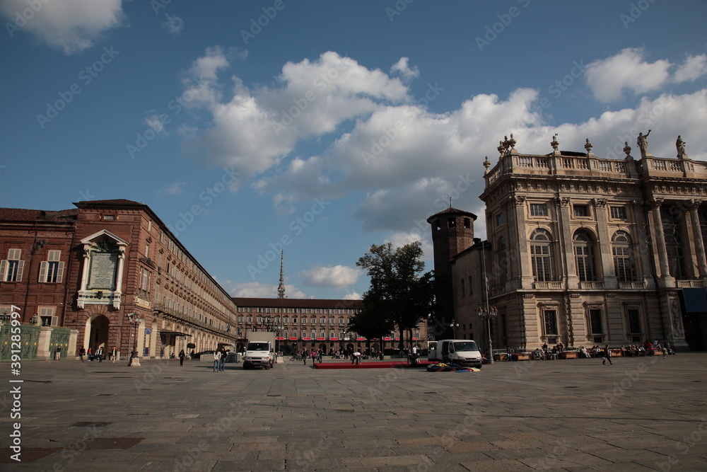 View of city square Piazza Castello and  Madama Palace under blue sky in Turin, Italy