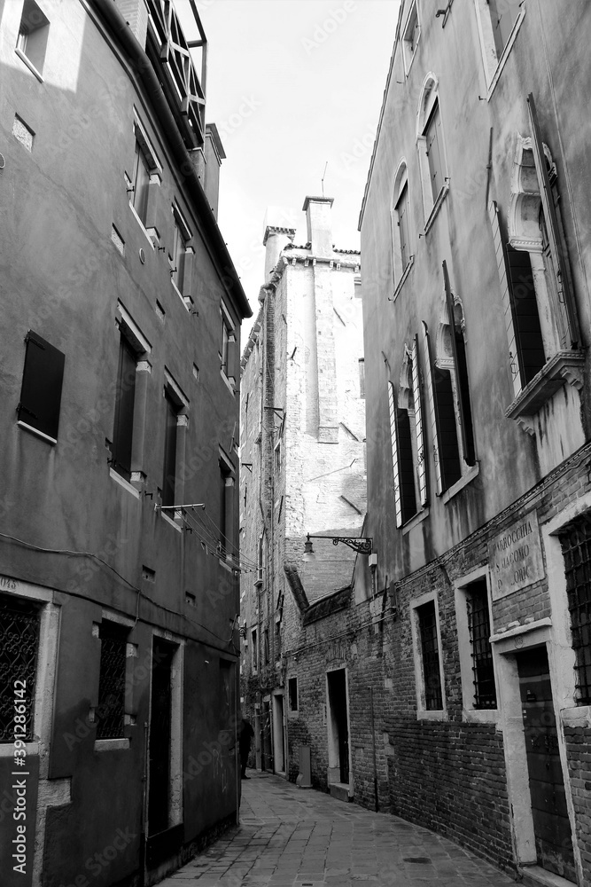 Venice, Italy, December 28, 2018 evocative image of the narrow calle of Venice
