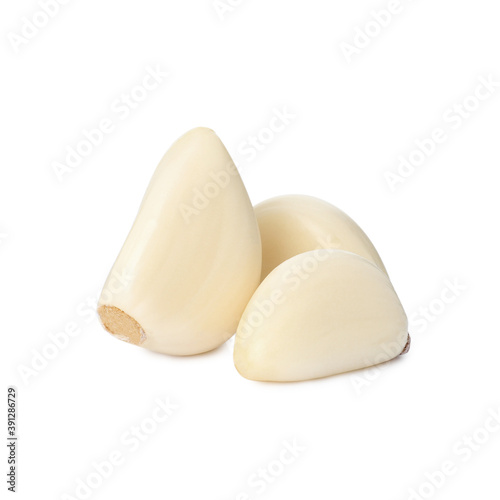 Fresh organic garlic cloves on white background