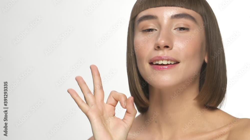 lovely female showing her face and making good gesture lovely female showing her face and making good gesture