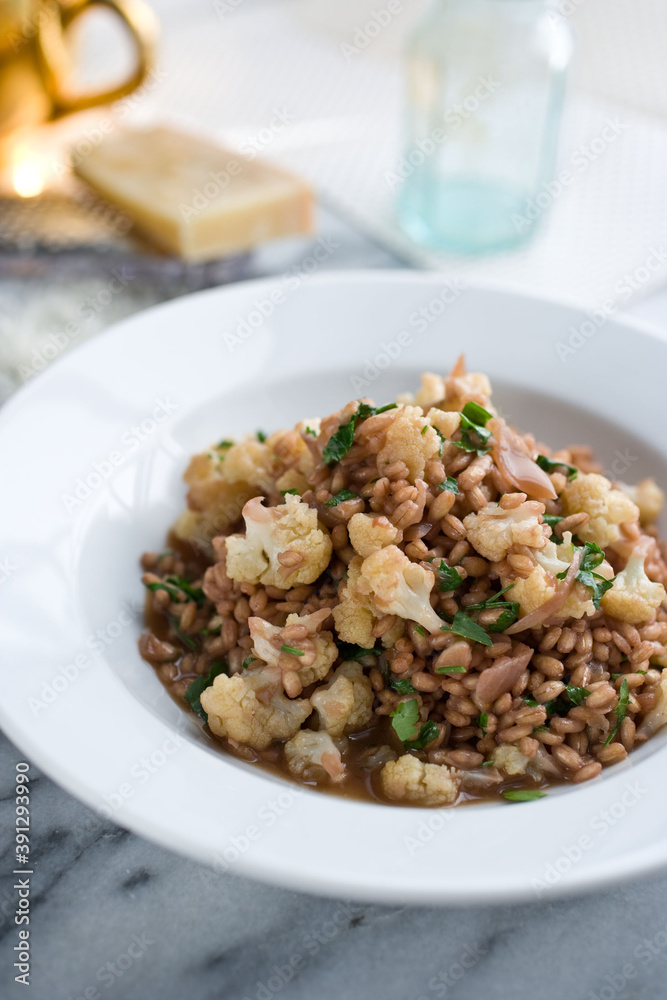 Close up of barley risotto with cauliflower and wine Close up of barley risotto with cauliflower and wine