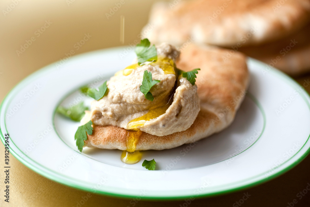 Baba ghanouj on plate with bread Baba ghanouj on plate with bread
