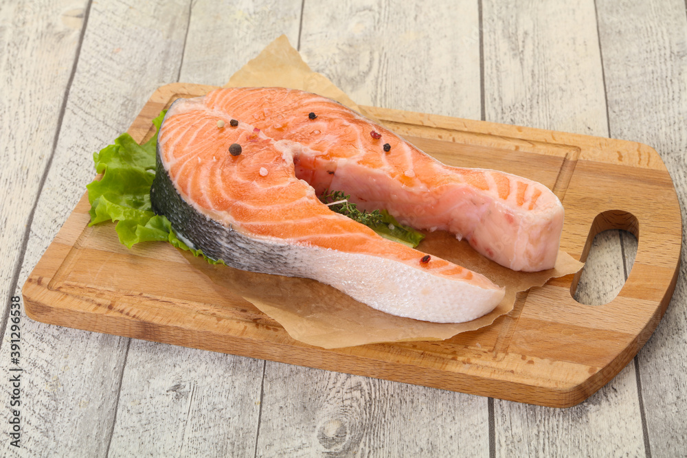 Raw salmon steak - ready for grill Raw salmon steak - ready for grill