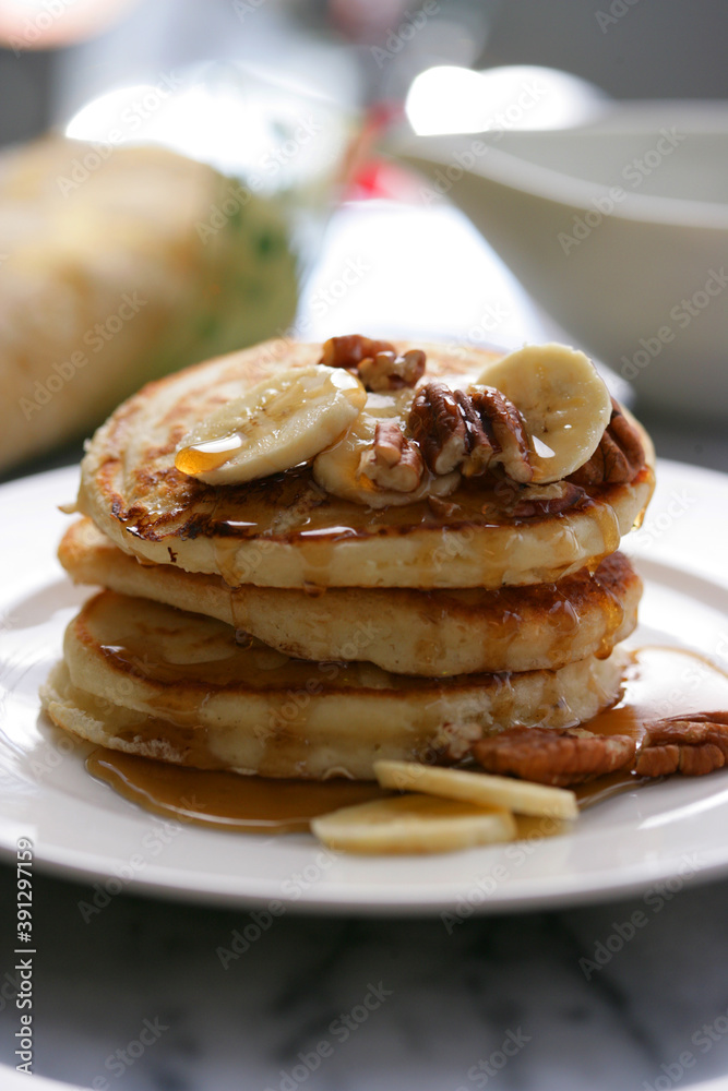 Close up of pancakes with fruits and syrup Close up of pancakes with fruits and syrup