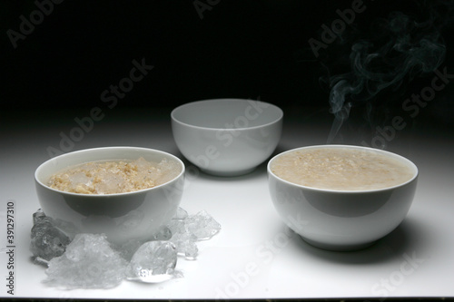 Close up of white bowls with porridge photo