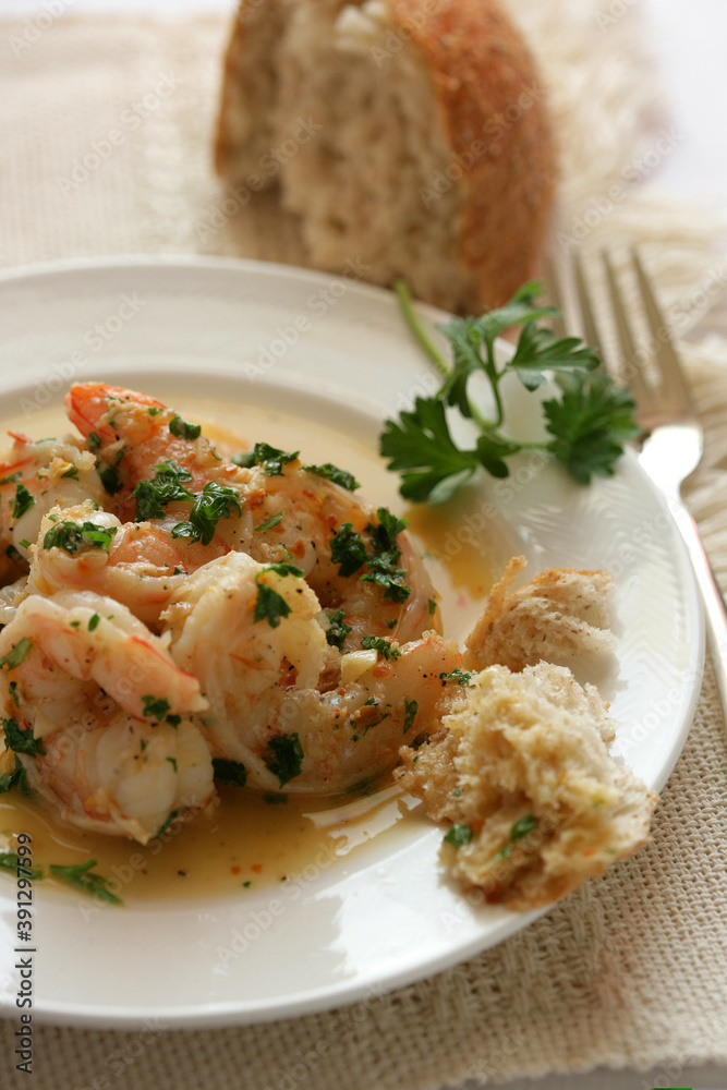 Close up of shrimps with parsley on plate Close up of shrimps with parsley on plate