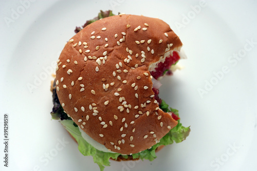 Close up of hamburger with lettuce and tomato