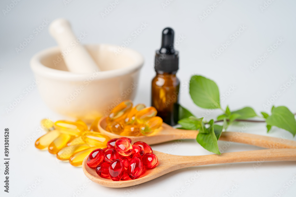 Alternative medicine herbal organic capsule with vitamin E omega 3 fish oil, mineral, drug with herbs leaf natural supplements for healthy good life.