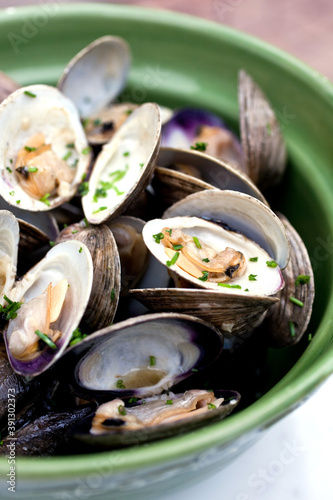 Close up of clams with lemon cayenne butter
