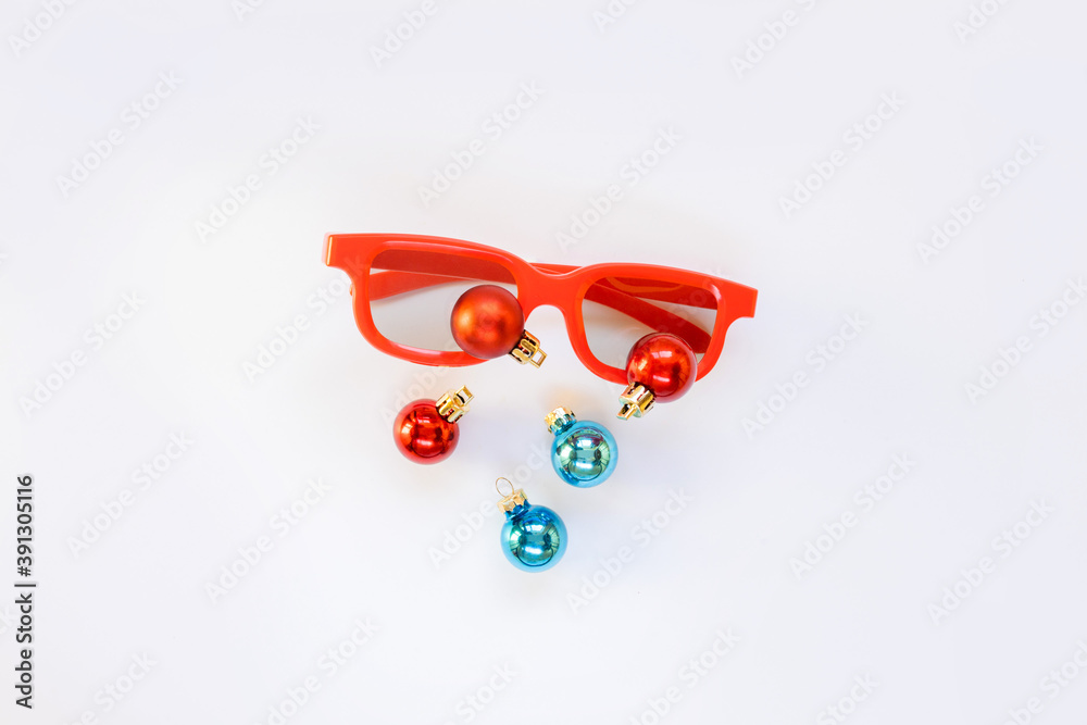 Christmas balls and 3D cinema glasses. Sunglasses. Christmas