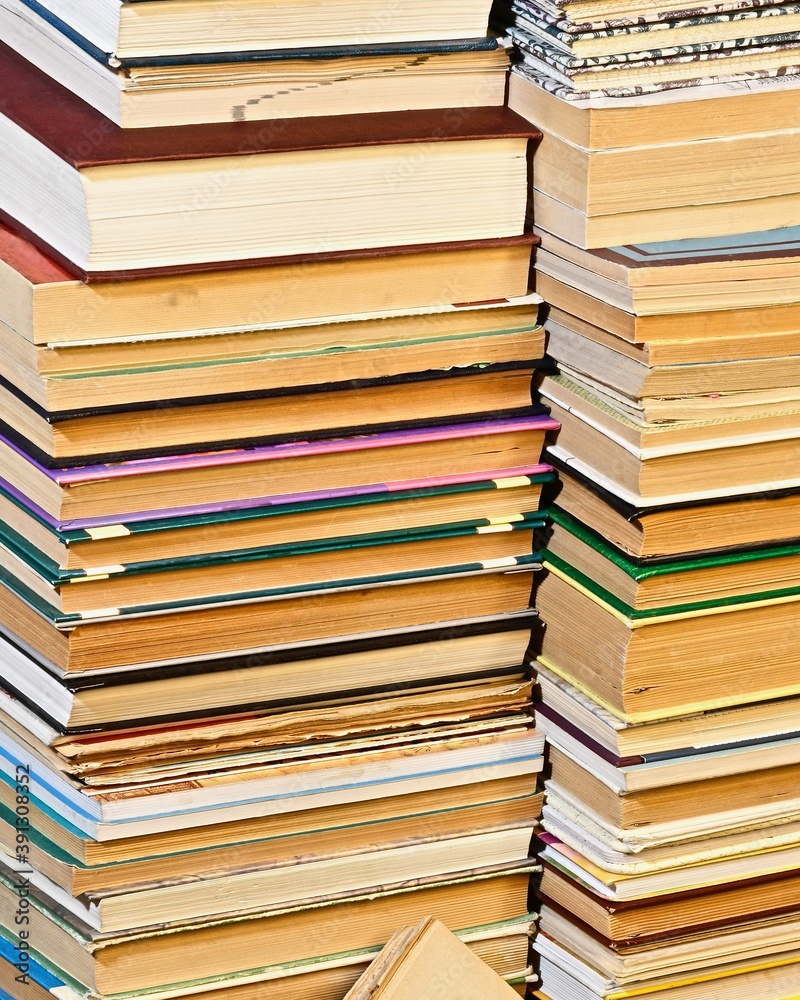 old variety of books that are rotated protipolozhnymi-binding parties lined uneven stacks old variety of books that are rotated protipolozhnymi-binding parties lined uneven stacks
