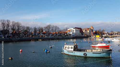 A small fishing boat in the city of Rostock, Germany