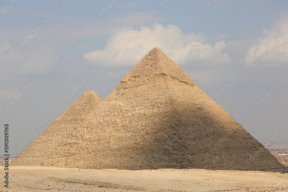 picture of the pyramid of King Khufu and the pyramid of King Khafre - the great historical pyramids of Giza in the light of day, one of the Seven Wonders of the World, Giza - Egypt picture of the pyramid of King Khufu and the pyramid of King Khafre - the great historical pyramids of Giza in the light of day, one of the Seven Wonders of the World, Giza - Egypt