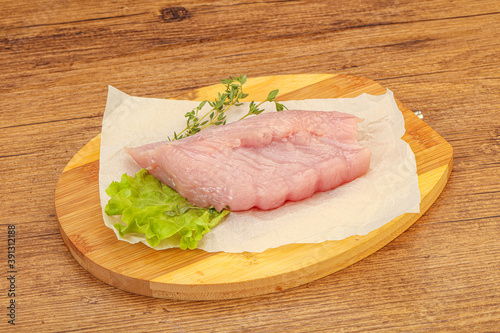 Raw turkey breast steak for cooking