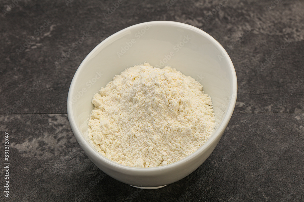 Wheat flour heap in the bowl Wheat flour heap in the bowl
