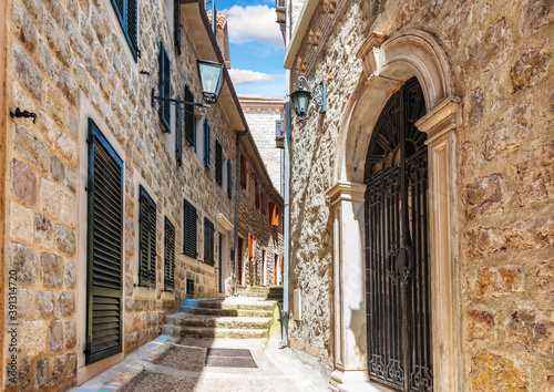 Fototapeta Naklejka Na Ścianę i Meble -  Medieval street in the Old Town of Herceg Novi, Montenegro, no people