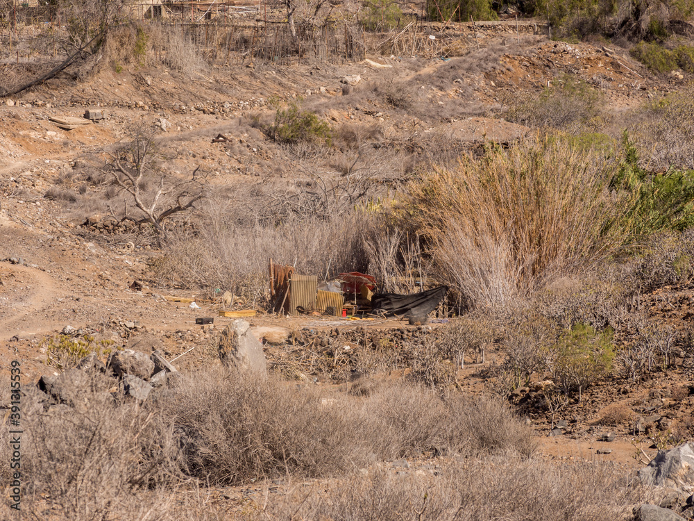 Evidance of rough sleepers on dry barren land at Playa San Juan, Teneriffe, Spain Evidance of rough sleepers on dry barren land at Playa San Juan, Teneriffe, Spain