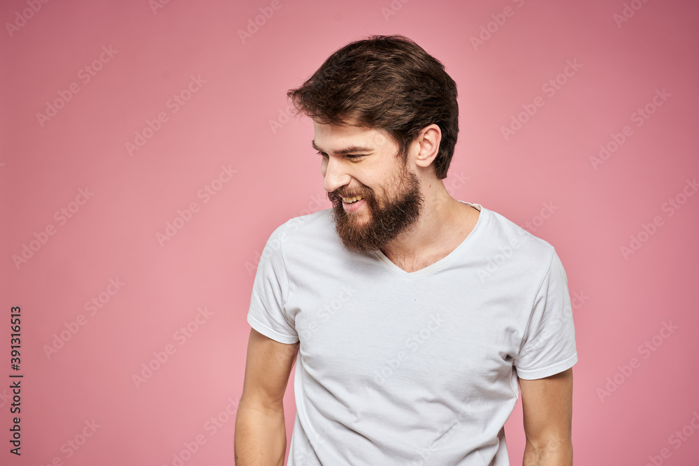 man in white t-shirt gesturing with his hands emotions fun pink background man in white t-shirt gesturing with his hands emotions fun pink background