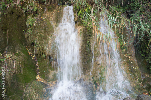 Fototapeta Naklejka Na Ścianę i Meble -  
Waterfall in a place of relaxation and meditation.