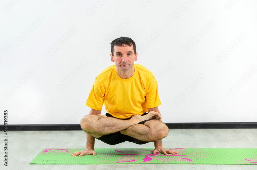 the camera and practices yoga. Yoga concept. the camera and practices yoga. Yoga concept.
