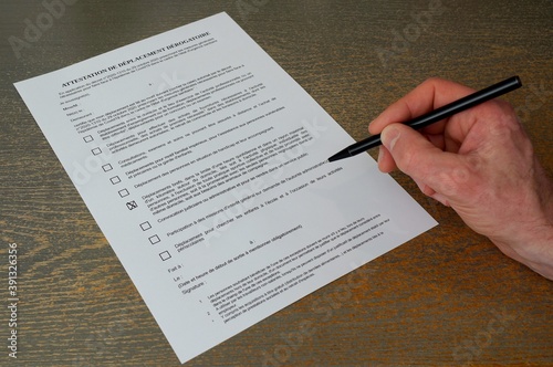 French permission form for trip out of home. France lockdown form for getting out. French attestation paper during covid disease. Fill in permission form during coronavirus lockdown.