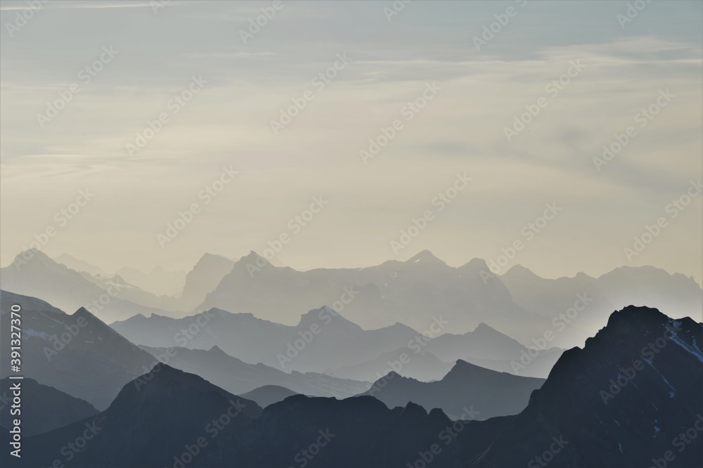 Mountain silhouette in the evening sun in the Swiss Alps