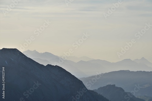 Mountain silhouette in the evening sun in the Swiss Alps