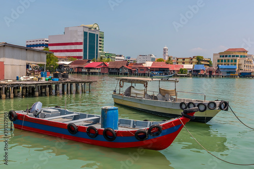 Fishing boats moored at the clan jetties in George Town, Penang Island, Malaysia, Asia