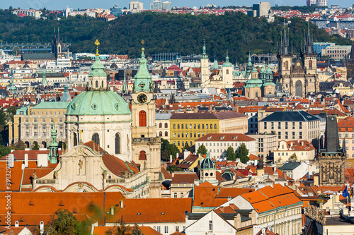 Prague, Czech republic - September 19, 2020. Famous towers above roofs 